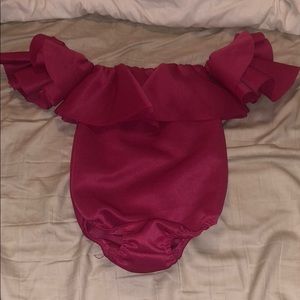 Brand new ruffled onesie